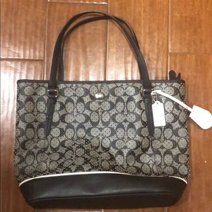 Black leather coach handbag